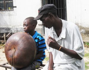 Alois Mutinhiri & son. Musicians who receive MBIRA Musicians Fund donation must also teach mbira to younger musicians in their community.